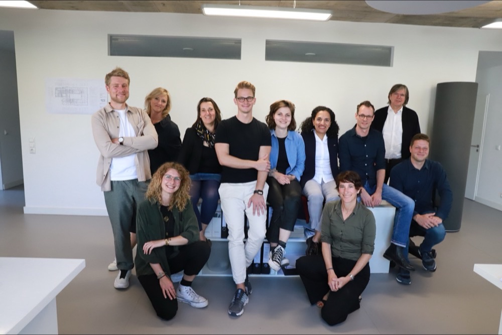 Teamfoto eines Unternehmens in Aachen – Mitarbeiterfotografie von Anna Wawra